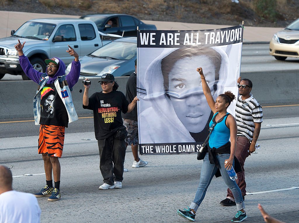 Demonstrators angry at the acquittal of George Zimmerman in the death of Black teen Trayvon Martin protest on the 10 Freeway stopping traffic in Los Angeles. 