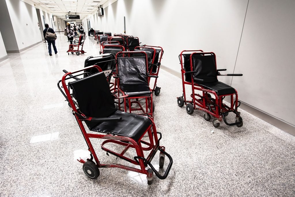 Group of wheelchairs stationed at an airport
